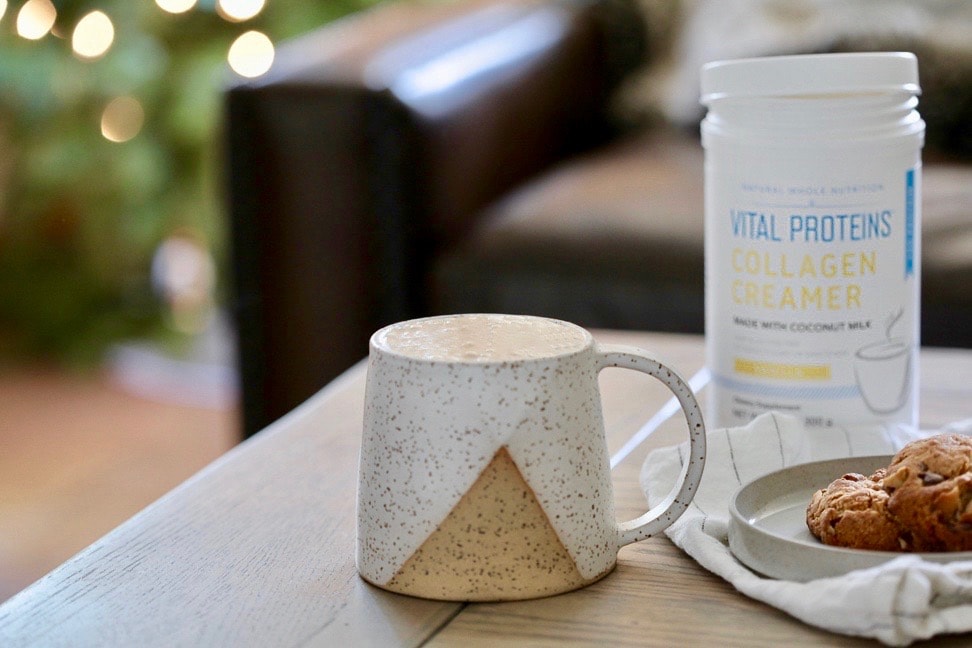 A cup of dairy-free egg nog latte with collagen protein.