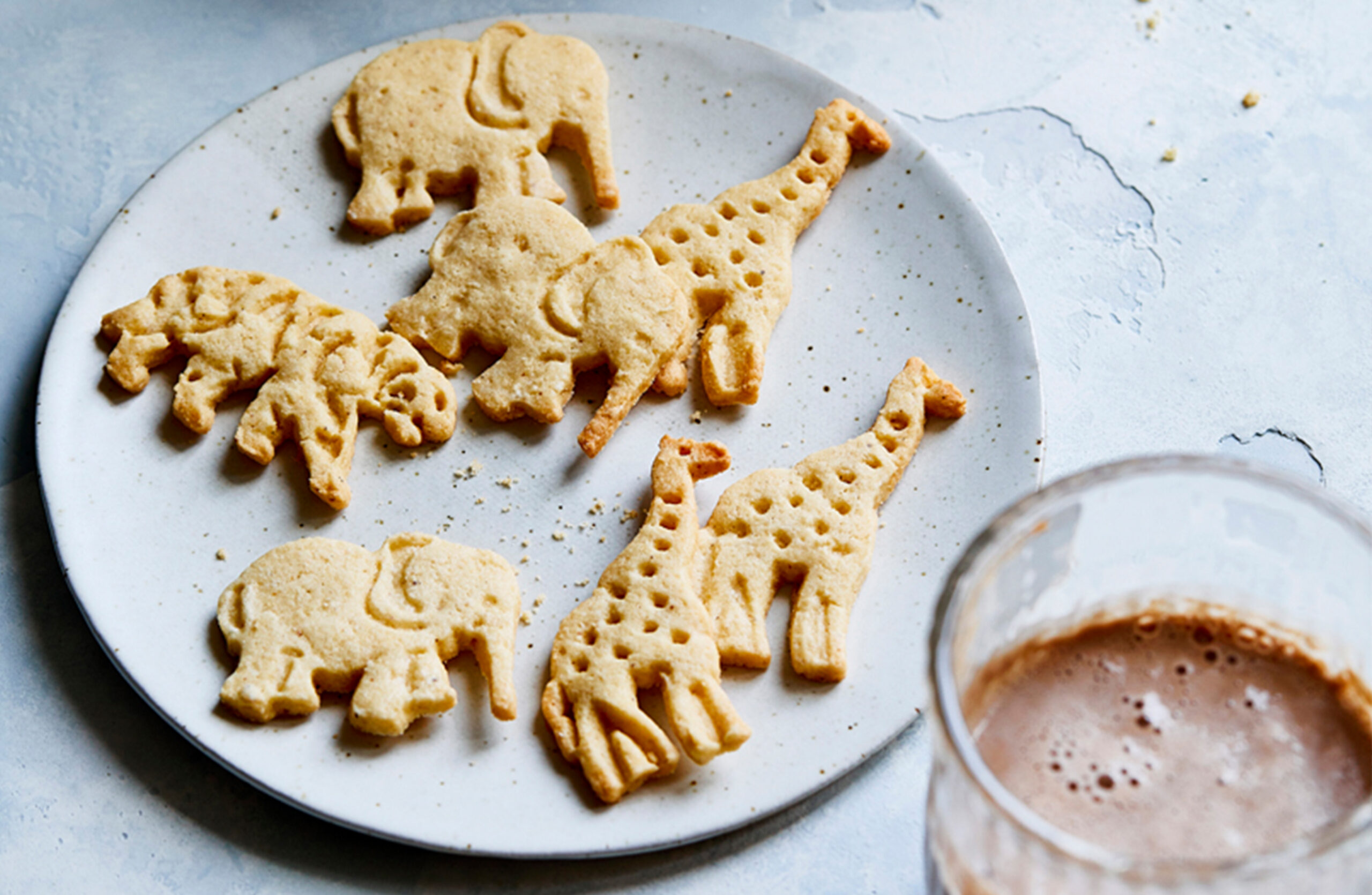 image of animal crackers on a white plate on the counter