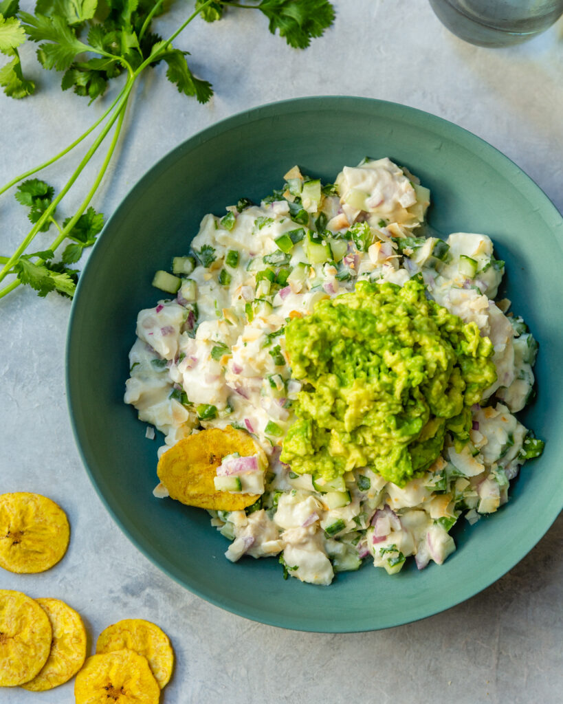 Hawaiian Ceviche in blue green bowl served with plantain chips