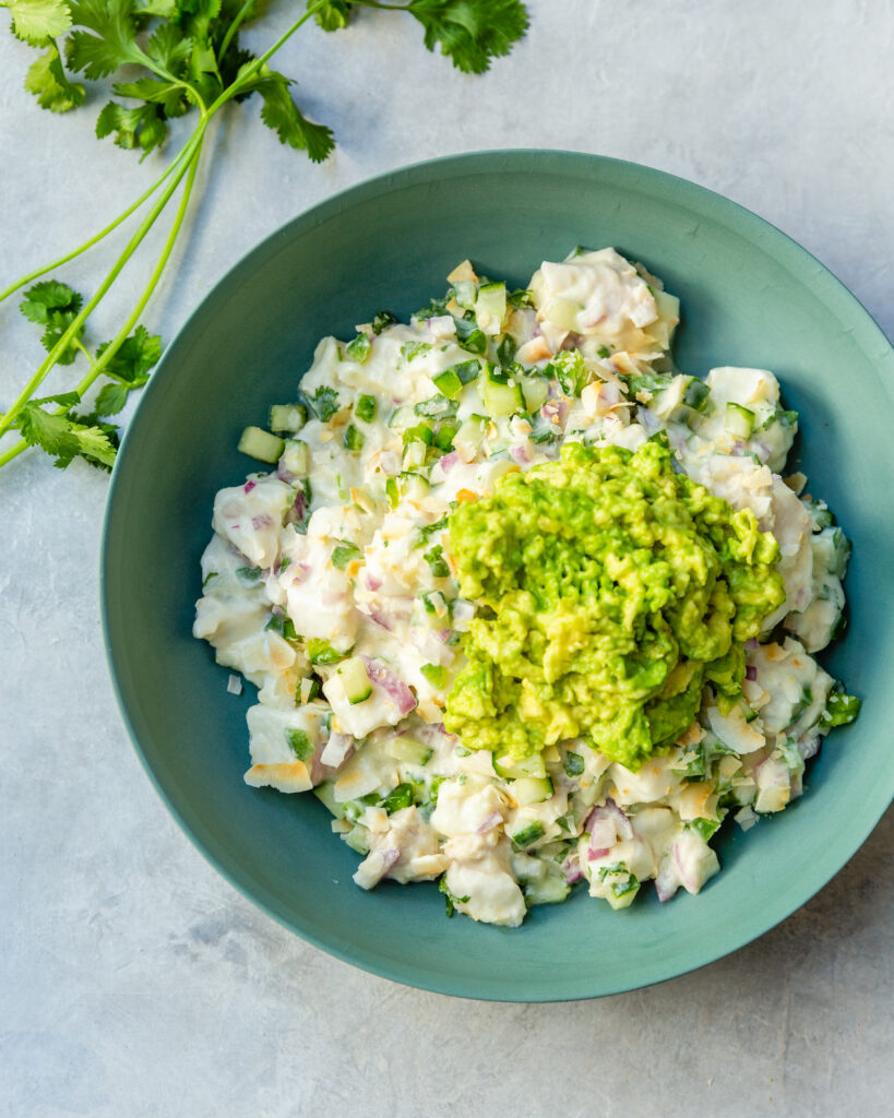 Hawaiian Ceviche in blue green bowl served with plantain chips