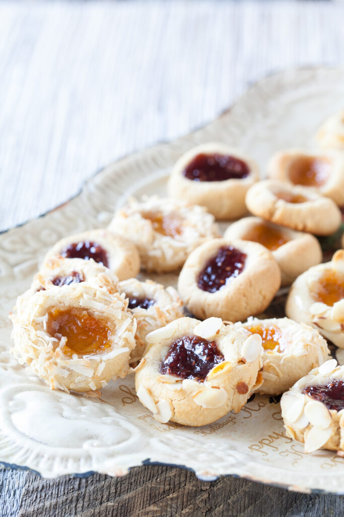 A variety of Thumprint Cookies pictured as part of a collection of gluten-free cookie recipes