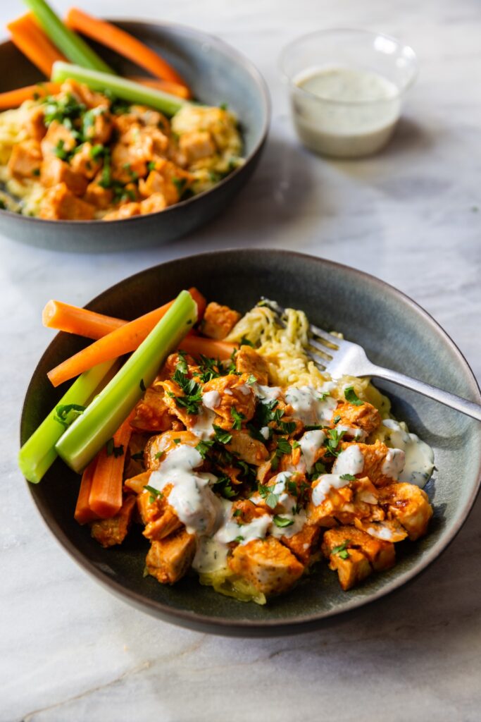 image of buffalo chicken spaghetti squash pasta with dairy free ranch dressing