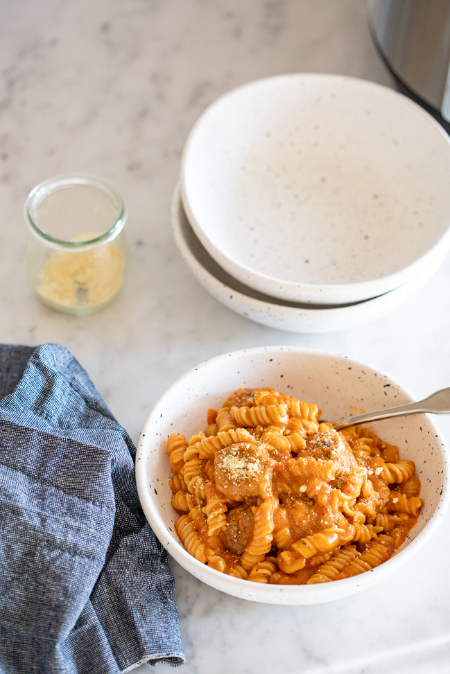 instant pot spaghetti and meatballs in a bowl on a counter