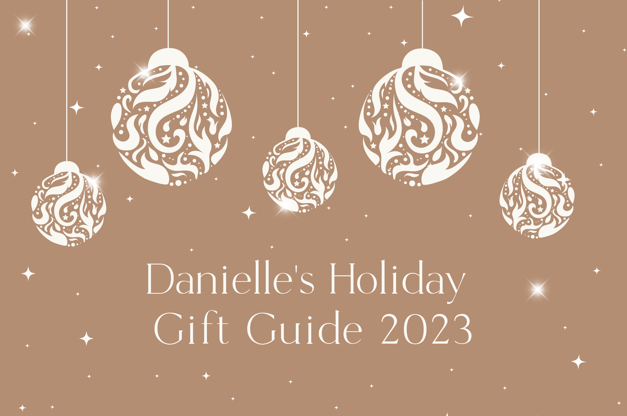 Hero cover image of Danielle's Holiday Gift Guide 2023 with Christmas ornaments hanging and sparkling